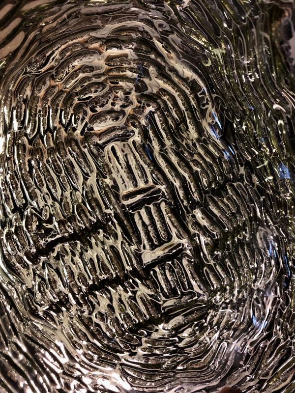 Close up of relief of glass basket